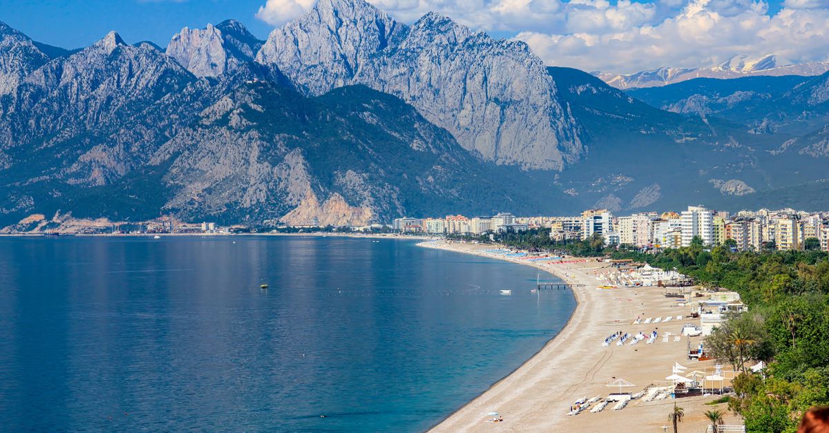 Aerial view of Antalya beach with the Taurus Mountains in the background.