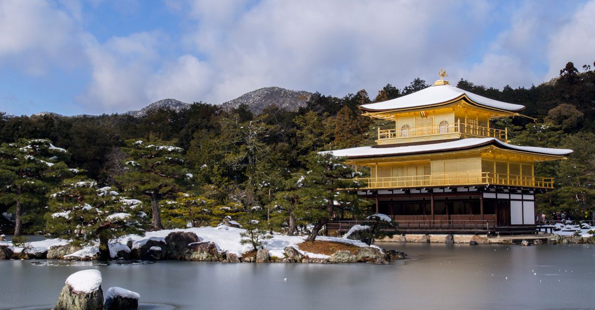 The Golden Pavilion in Kyoto surrounded by snow in winter