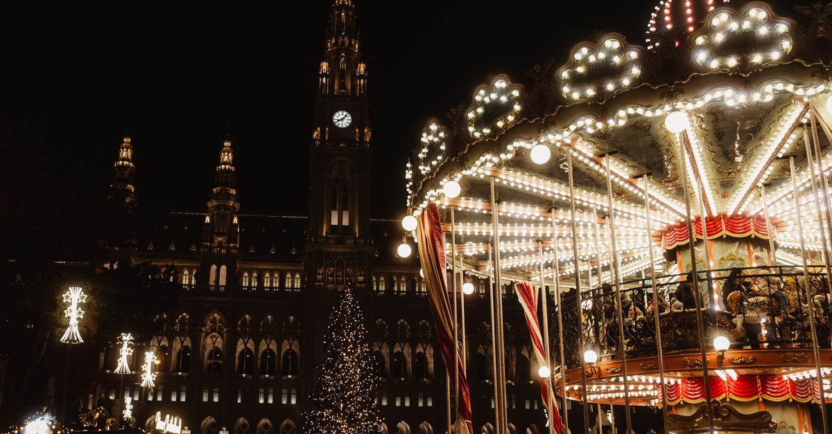 A carousel at a Vienna Christmas market at night